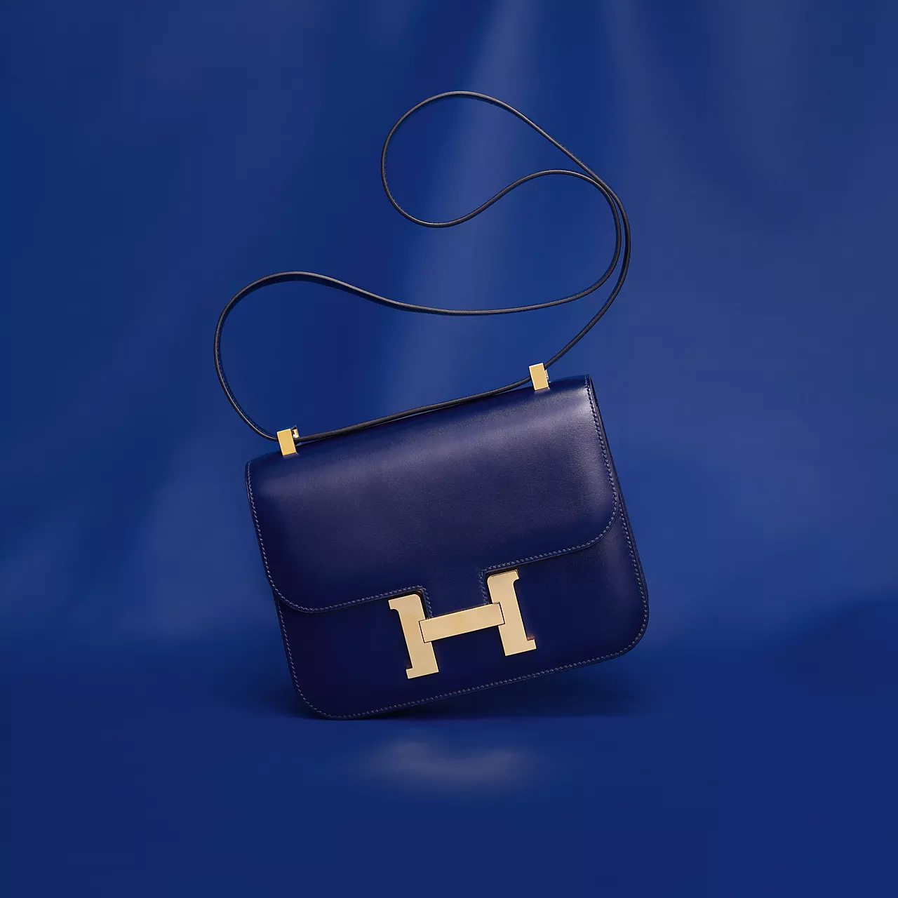 Constance: The Bag Named After A NewbornThe Constance dates back to 1959, and its origin is a sweet one. Hermès' Executive Chairman Jean-Louis Dumas asked a young designer to create a new bag for the house, and she named it after her newborn daughter, Constance. It went on to become one of Hermès' most enduring pieces, instantly identifiable by its structured flap and that oversized H clasp, and versatile enough to work as a crossbody or shoulder bag depending on the day. In India, a Constance in classic leather like Epsom typically starts upward of ₹9-10 lakh, with rarer skins and larger sizes climbing well past ₹15 lakh. Constance: The Bag Named After A NewbornThe Constance dates back to 1959, and its origin is a sweet one. Hermès' Executive Chairman Jean-Louis Dumas asked a young designer to create a new bag for the house, and she named it after her newborn daughter, Constance. It went on to become one of Hermès' most enduring pieces, instantly identifiable by its structured flap and that oversized H clasp, and versatile enough to work as a crossbody or shoulder bag depending on the day. In India, a Constance in classic leather like Epsom typically starts upward of ₹9-10 lakh, with rarer skins and larger sizes climbing well past ₹15 lakh.